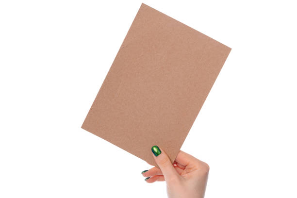 istock Craft paper card in female hand isolated on white 2189193530