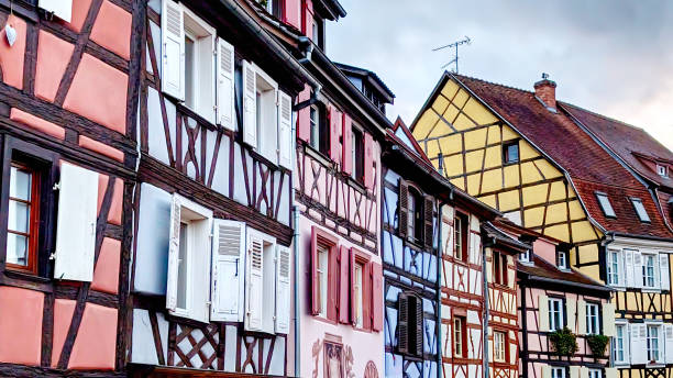 istock Charming half-timbered gingerbread houses adorned with decorations in a quaint village during festive season, Colmar, Alsace, France 2189195497