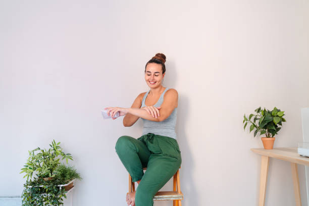istock Satisfied young  woman enjoying her beauty routine 2189196119