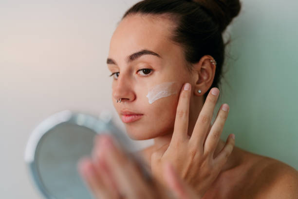 istock Young woman doing her beauty care routine 2189196350