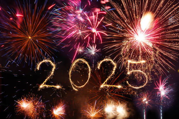 istock Happy new year 2025 written with Sparkle firework on black background, 2189197703
