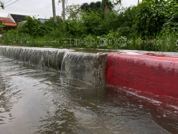 istock Water overflows from river, causing floods on the street 2189197956