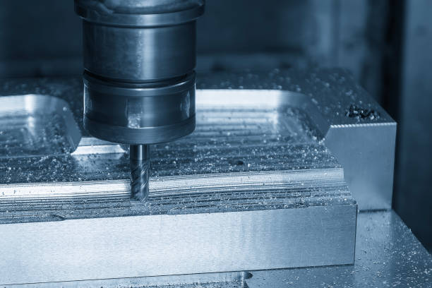 istock The CNC milling machine cutting press die part by solid bull nose end mill tool. 2189198901