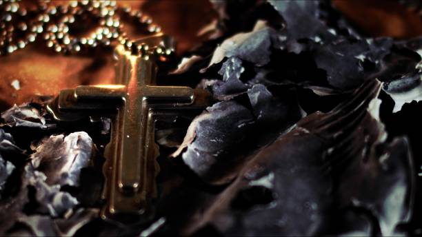 istock Christian Religion Symbol Cross in Fire and Ashes 2189198991