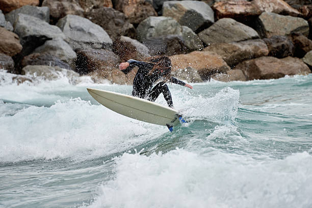 Twelve surfboards in column, Lake Garda, Italy
