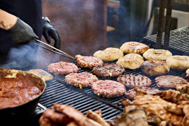 istock Cutlets and meat on barbecue 2189202260