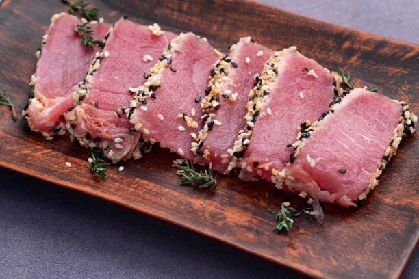 istock Sliced tuna steak with sesame photography . Top view 2189204485