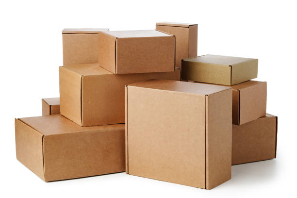 istock Stacked brown cardboard boxes in various sizes arranged on a white background 2189207202