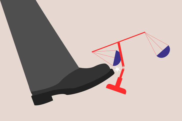 istock Kick the scales of justice. concept no fair, Corruption and dishonesty 2189209232