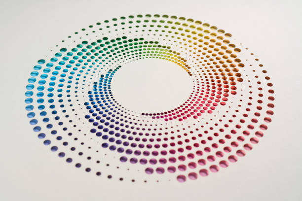 istock Vibrant circular perforated paper design featuring a seamless rainbow gradient on a white background. 2189213671