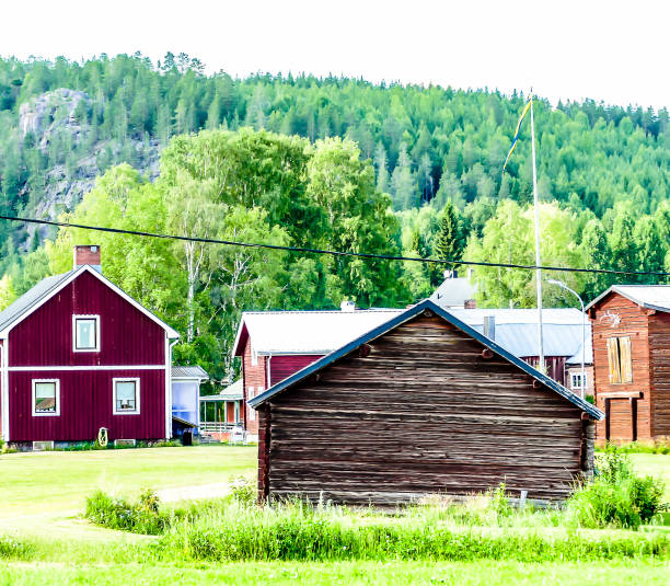 istock A rural area with a few houses and a barn 2189214101