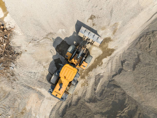 istock bulldozer on earthmoving at construction site, aerial view. 2189216286