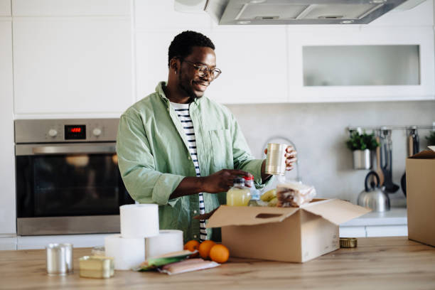 istock Man donating food for poor people 2189216331