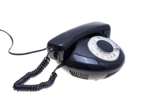 black retro telephone isolated on white background