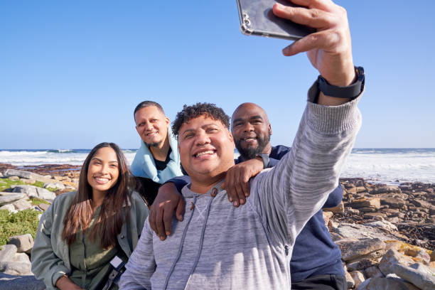 istock Friends taking selfie on rocks in landscape 2189219833