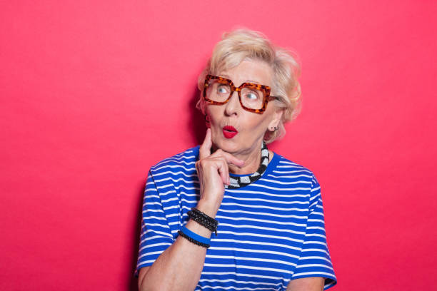 istock Portrait of surprised cool senior lady 2189227425