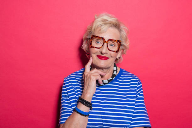 Portrait of surprised cool senior lady