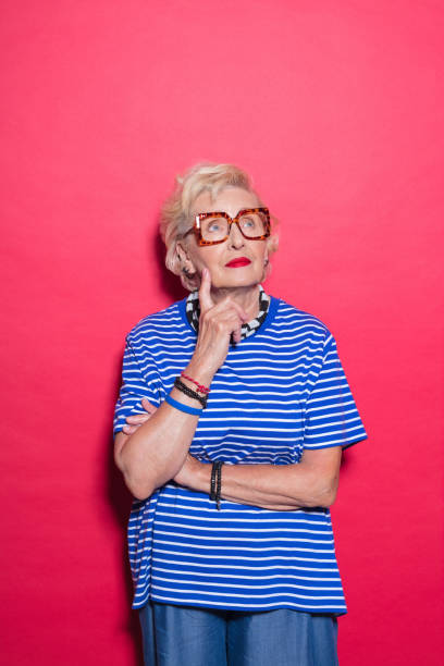 istock Portrait of thoughtful senior lady 2189228178