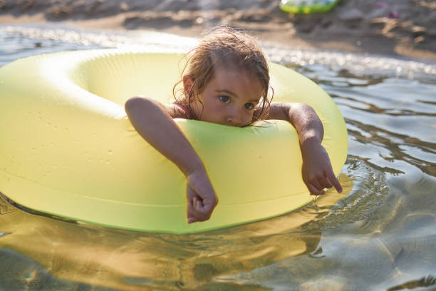 istock Beautiful girl enjoying summer vacation 2189228602