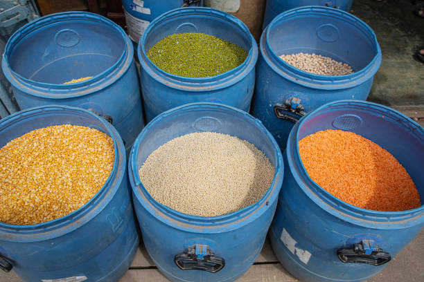 Several varieties of tropical vegetables neatly arranged for sale in local market in Sri Lanka. different types of cereals