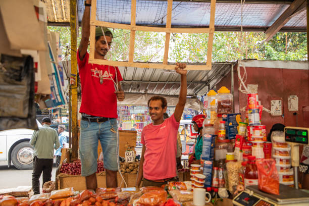 Colombo, Sri-Lanka. 03. 02. 2023. Crowded central food Market in Colombo. people sell things and food directly from street on small trays or directly from ground. traditional type of trade Sri Lanka
