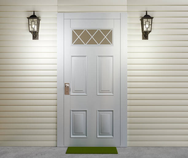 istock White residential door and two street lanterns. 3D render. 2189245303