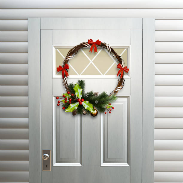 istock Christmas wreath hanging on residential door. 3D render. 2189245341