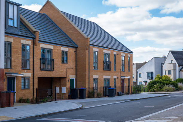 istock traditional detached house within residential estate in England UK 2189246565