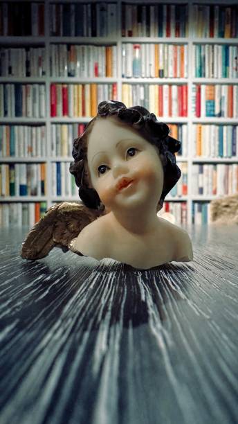 Christmas decoration in the library, angel's broken head