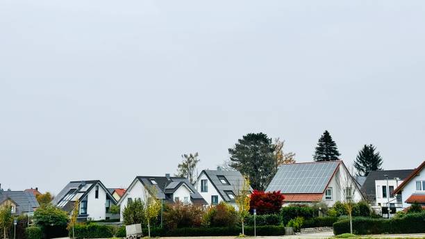 istock Houses in the suburbs with solar panels 2189250858
