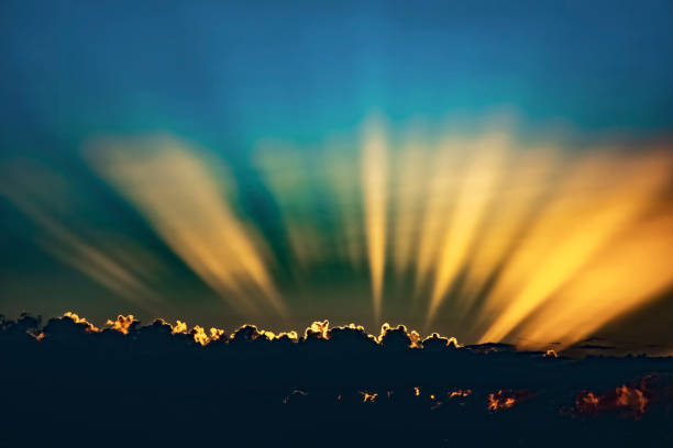 Sunrise, the colorful rays of the rising sun, a beautiful natural backdrop with sunlight
