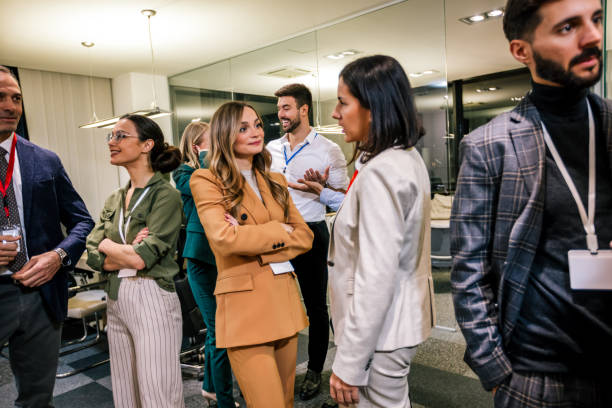 istock Business colleagues talking after an seminar in their office. 2189253673