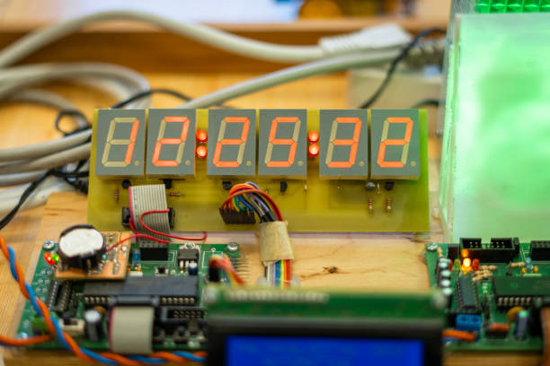istock Close-up of the inside of a digital clock circuit with a dial 2189255605