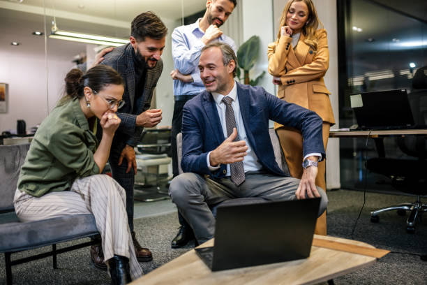 istock Workers group and team leader having teamwork discussion managing project at work in meeting room. 2189255769