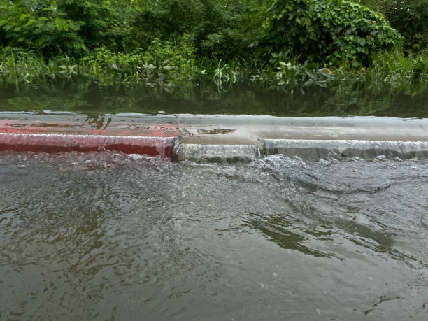 istock Water overflows from river, causing floods on the street 2189258767
