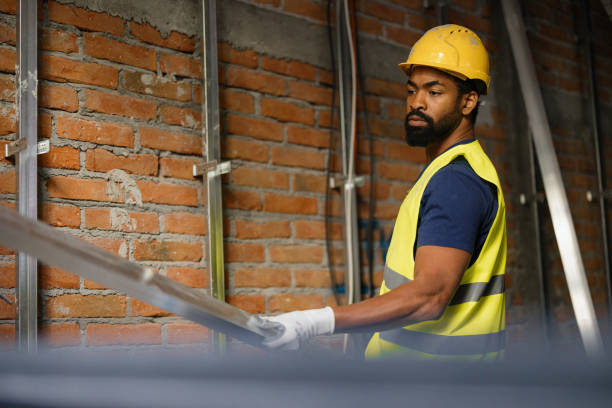 istock Construction Worker In Safety Gear At Industrial Work Site 2189260249
