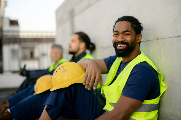 istock Smiling Construction Worker During Break on Urban Job Site 2189260387