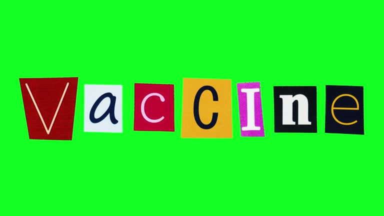 The word vaccine compiled from funny moving stickers filmed in loop stop motion on green screen