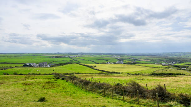 The Antrim Coastline in Northern Ireland is one of the most scenic and dramatic coastal areas in Europe, famous for its rugged cliffs, picturesque villages, and natural wonders.