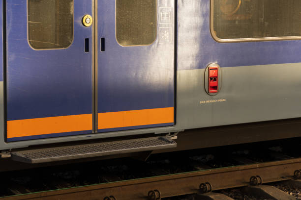istock The striking blue train doors stand prominently at a busy station, highlighting their sleek design and welcoming commuters as the vibrant environment hums with anticipation 2189270318