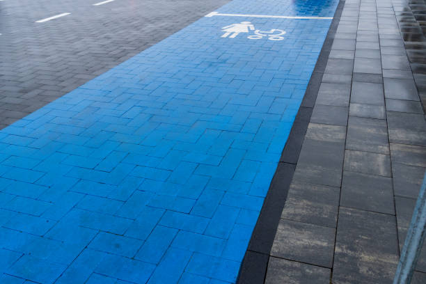 istock A newly developed blue lane designed for pedestrians and cyclists runs alongside a paved road, enhancing safety and promoting alternative transportation in a city environment 2189270375