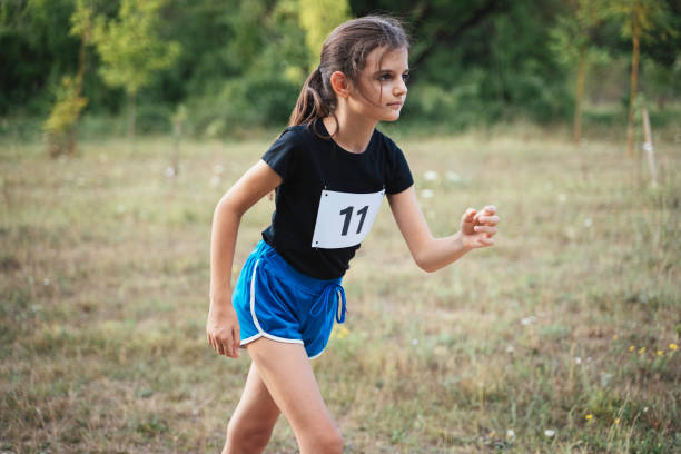 istock Girl with number: poised for success and pride. 2189275297