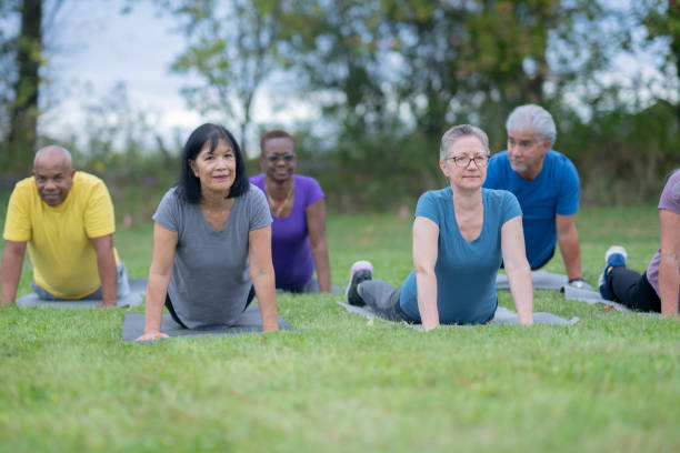 istock Outdoor Adult Yoga Class 2189278613