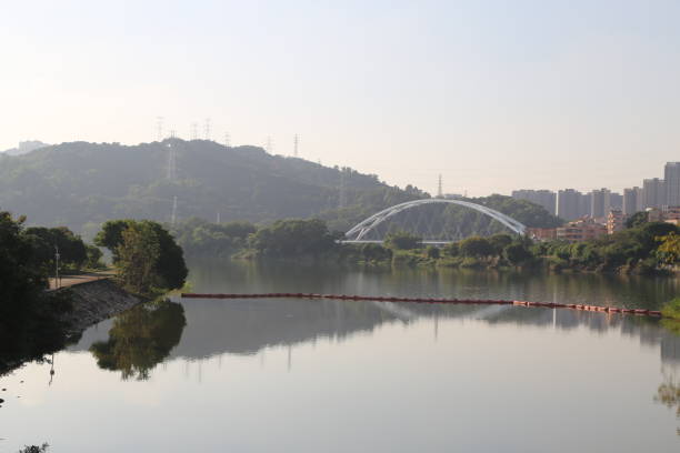 istock A bridge spans a river with a city in the background 2189278870