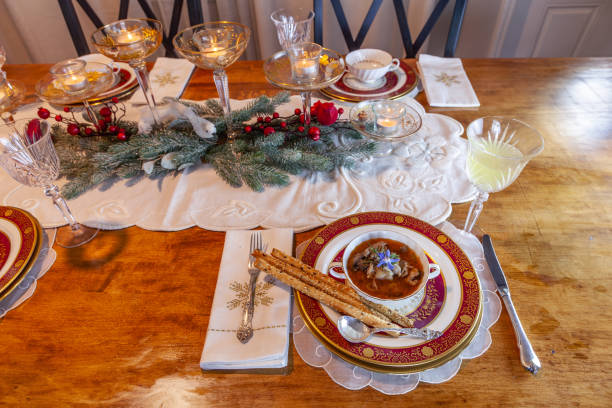 istock Duck stew and bread sticks on fine China place settings 2189278924