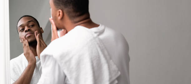 istock Skin routine beard care man touching face stubble 2189279017