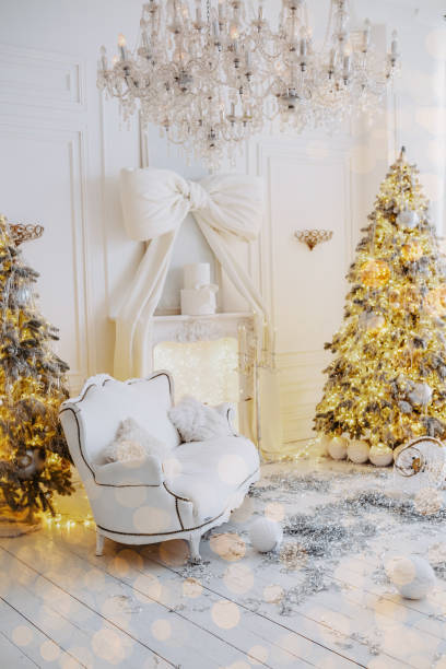istock Elegant winter decor with Christmas tree and gift box in cozy setting 2189281037