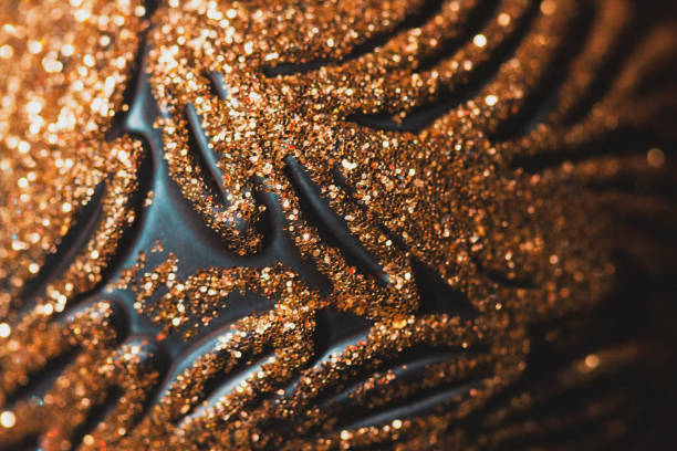 Golden Glitter Texture in Abstract Close-Up.