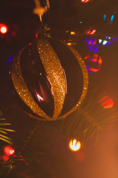 Festive Christmas Ornament with Glittering Lights. Macro christmas decoration.