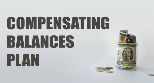 istock Compensating Balances Plan - text on a white background with a piggy bank 2189302776